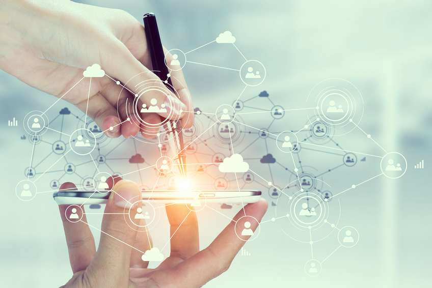 Hand holding smartphone and connection lines as social network concept