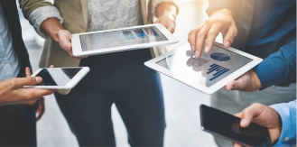 Group of businesspeople working on tablets and phones